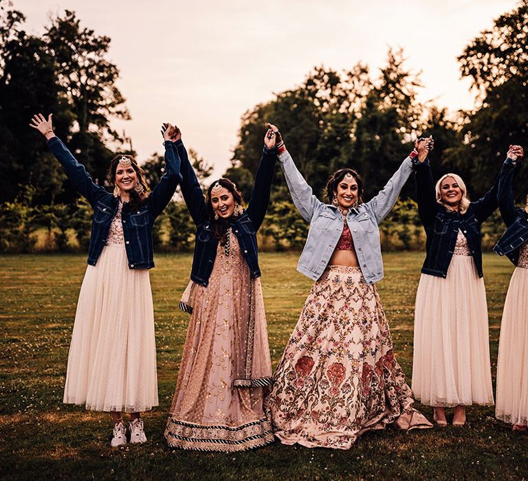 Bride & her bridesmaids wear personalised denim jackets