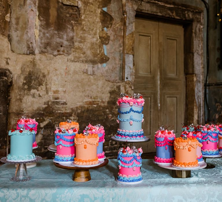 15 mini wedding cakes with retro styling and disco ball decor 