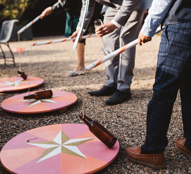 Outdoor wedding games inspired by the fairground setting at Preston Court 