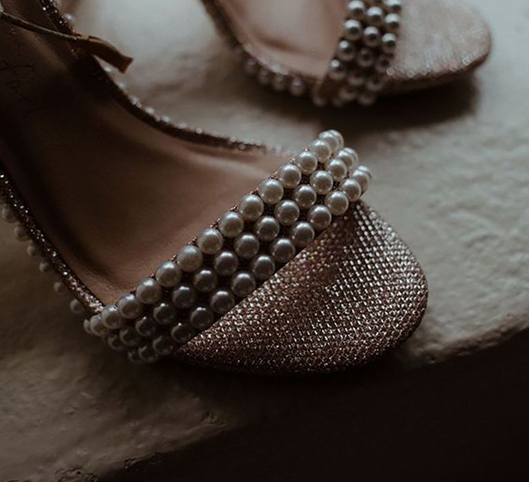 Close up image of pearl wedding shoes by Lilly Wilson Photography