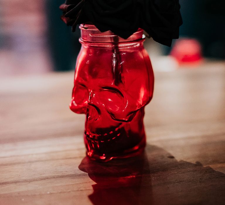 Skull vase with black flower decoration for gothic wedding 