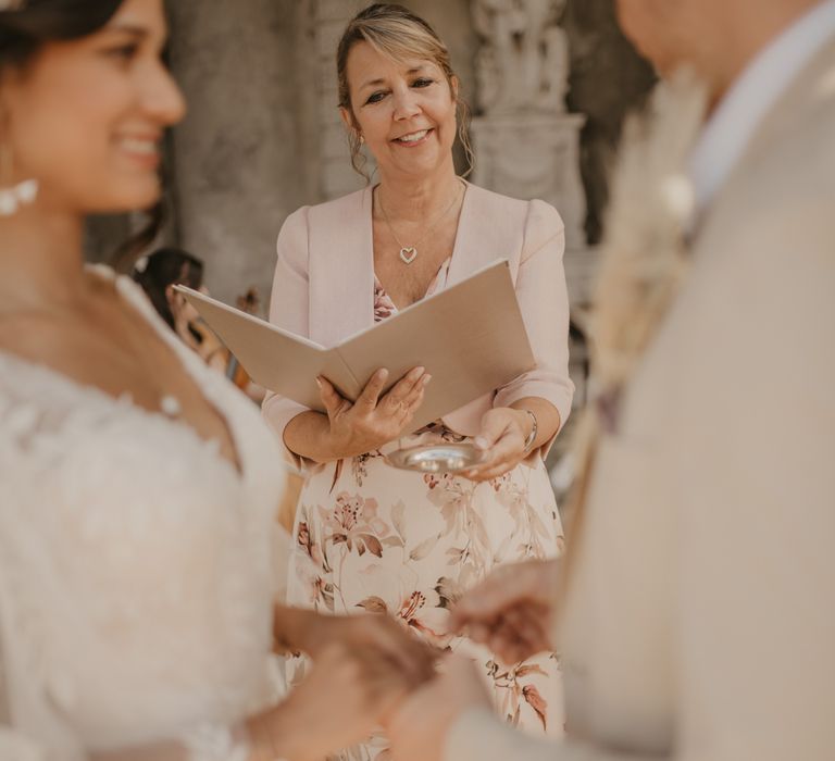 Wedding celebrant at intimate outdoor wedding 