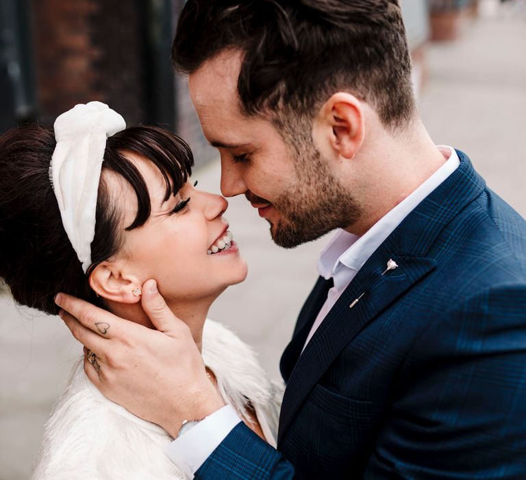 Bride wearing a lace turban headband 