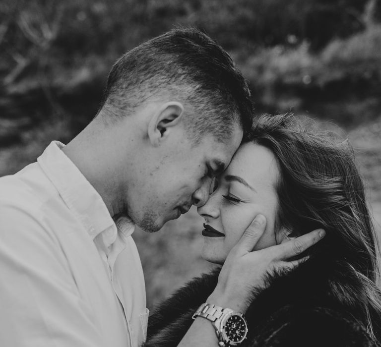 Intimate black and white wedding portrait during engagement session