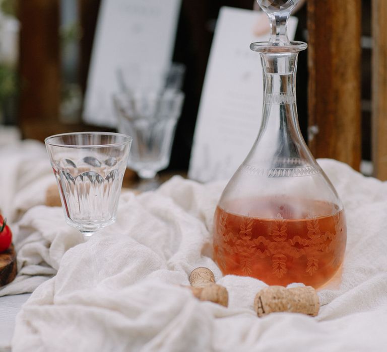 Vintage wine carafe for a rustic French wedding at Chateau de la Ruche