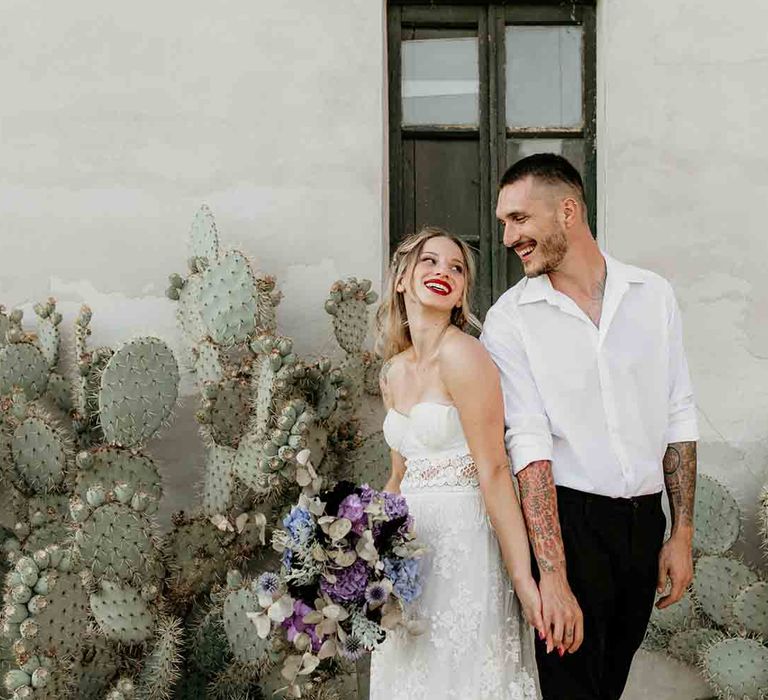 Bride and groom at intimate elopement shoot with Hydrangea wedding flowers