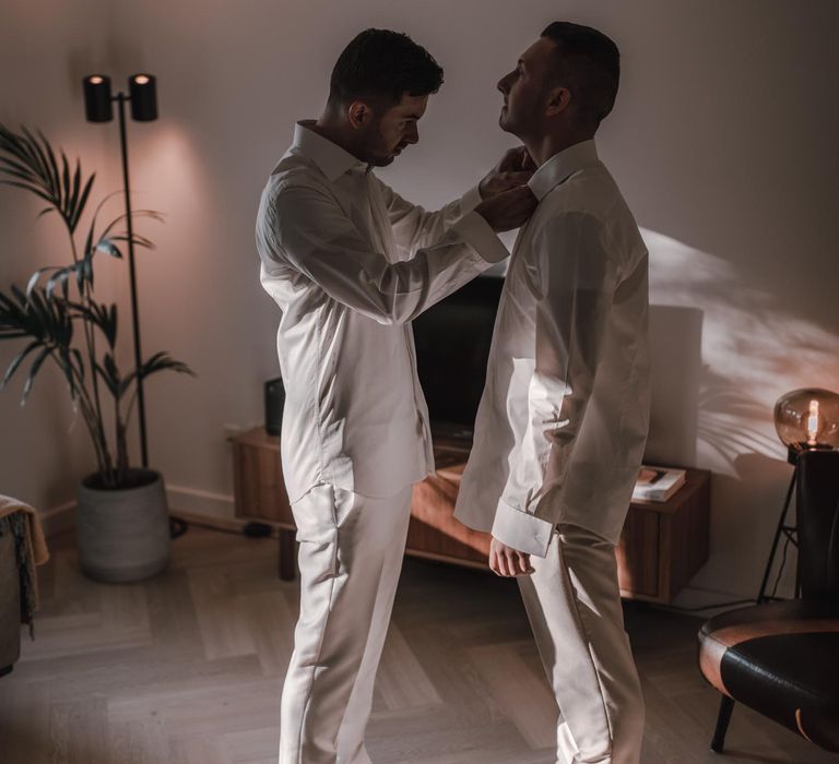 Groom preparations for gay wedding