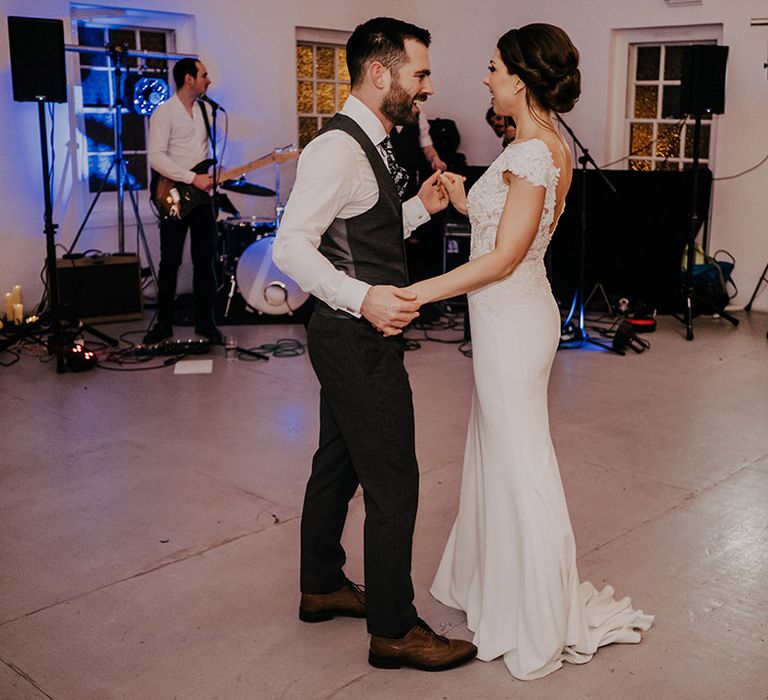 Bride & groom dance during reception on their wedding day