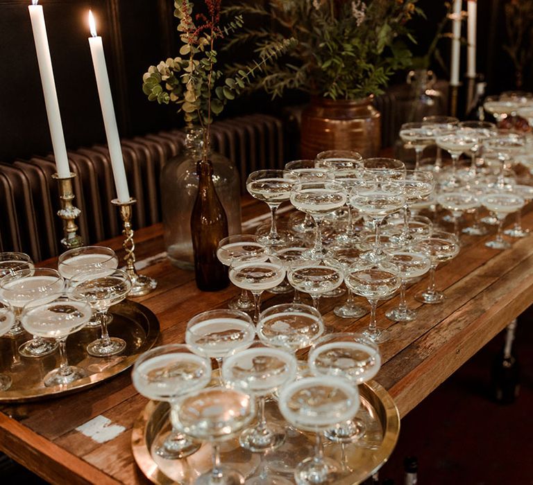 Champagne towers on wooden table 