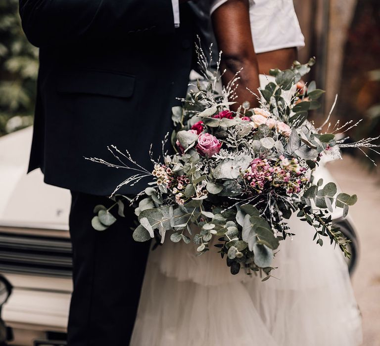 Bridal bouquet featuring eucalyptus, pink roses and waxflower