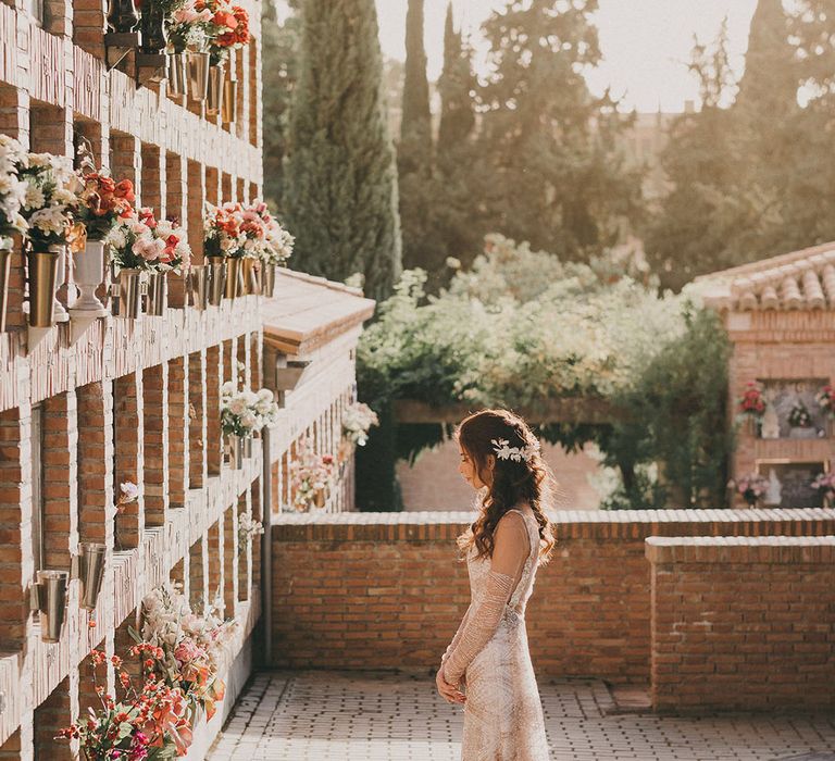 bride in a gold pattern wedding dress at Spanish destination wedding 