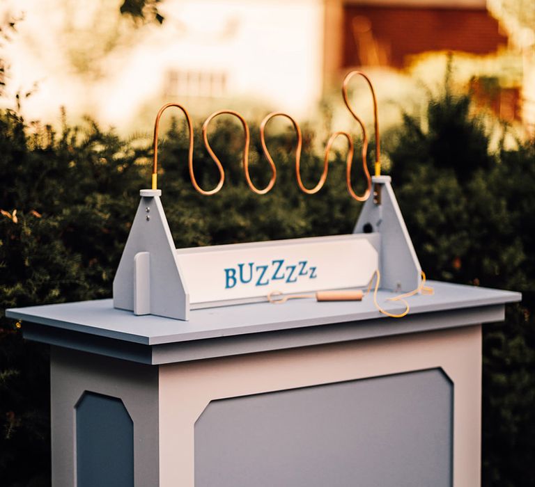 Buzz the wire wedding fairground games for outdoor celebrations 