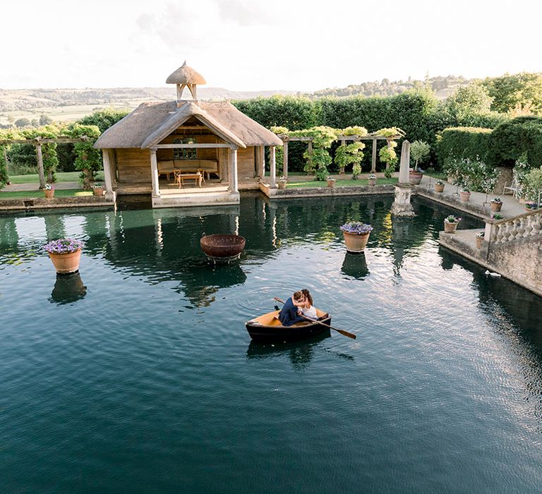 water feature and thatched boathouse at Euridge Manor luxury wedding venue 