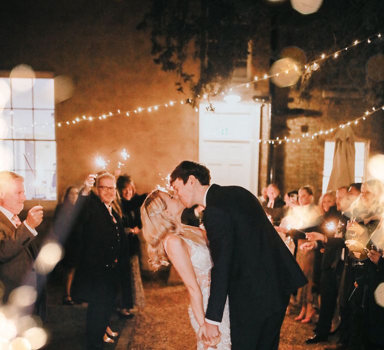 Sparkler send off at magical Christmas winter wedding 