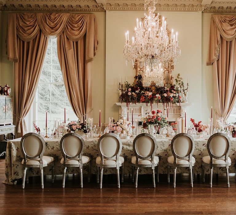 Prestwold Hall country house wedding venue with traditional wedding breakfast set up with pink and red theme 