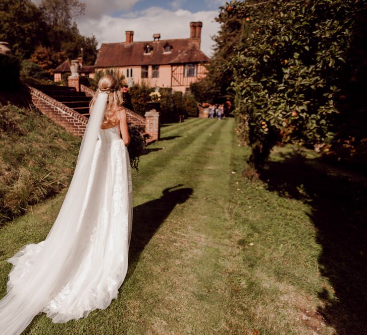 Beautiful bride with veil at Larmer Tree Gardens Wedding