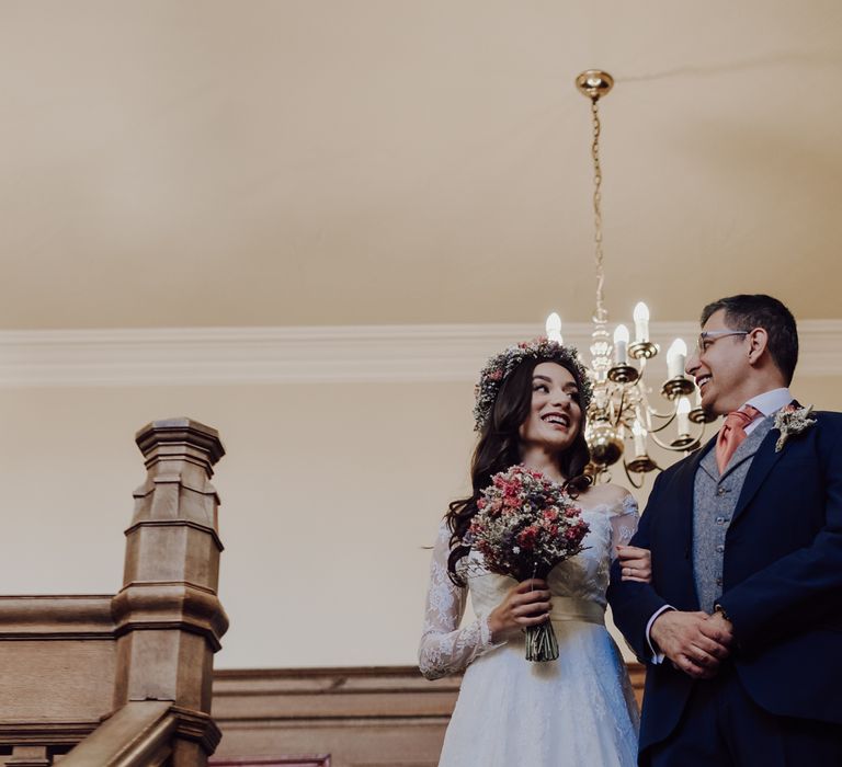 Bride walks with her dad to wedding ceremony wearing ASOS bridal dress