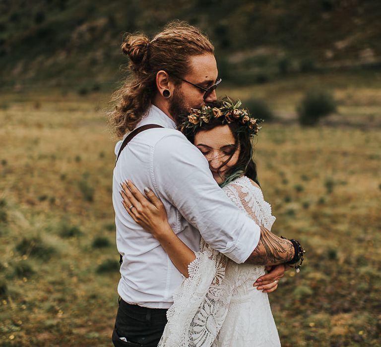 Bride & groom hug after wedding ceremony