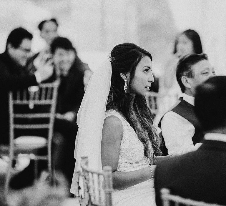 Bride during wedding reception in black & white photo