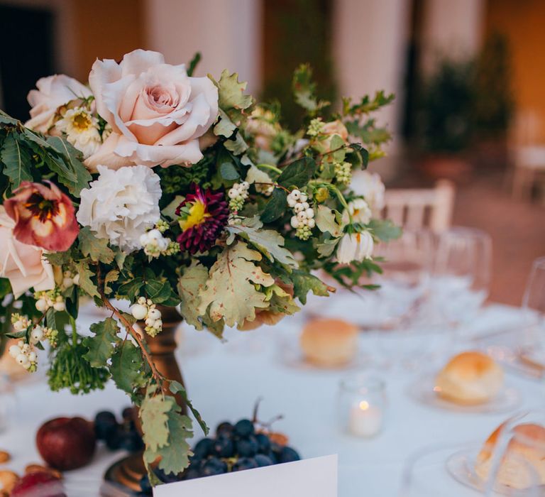 Wine themed wedding tables with a place card reading 'pinot nero'