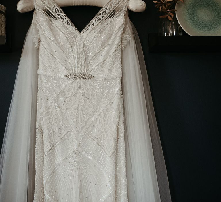 Beaded and sequin embroidered Eliza Jane Howell wedding dress with tule cape veil