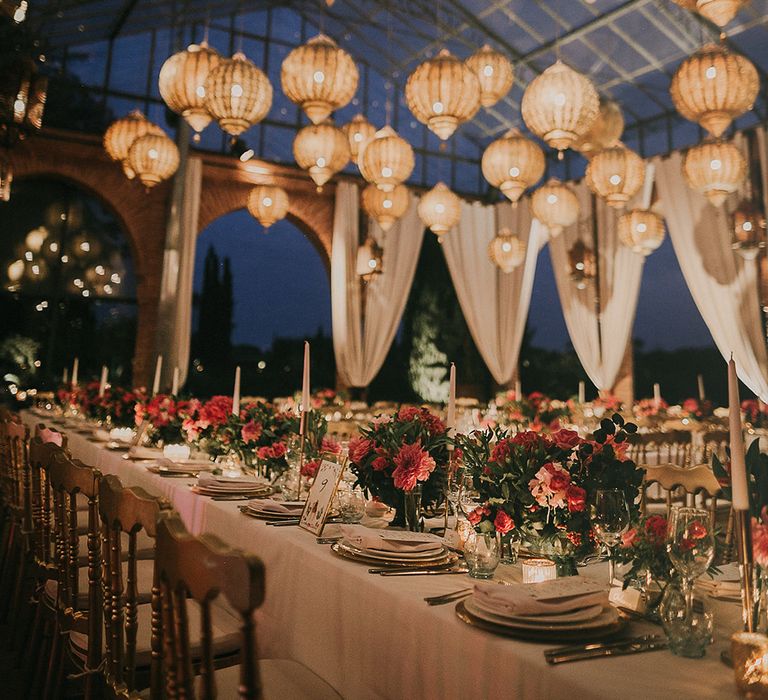 Lanterns shine above outdoor Marrakech wedding reception in striking photo