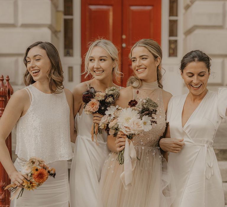 Bridal party portrait at Clerkenwell House wedding with natural makeup up, tulle and lace dresses and wavy hair 