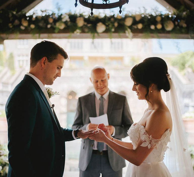 Bride & groom during their bespoke wedding ceremony at Euridge Manor