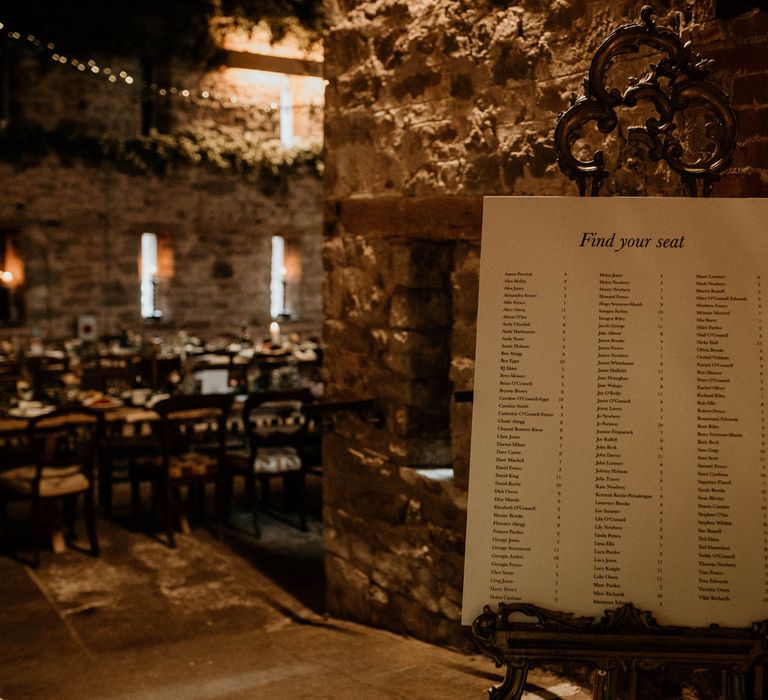 Minimalistic wedding seating plan for rustic wedding breakfast in stone barn at Lyde Court in Hereford