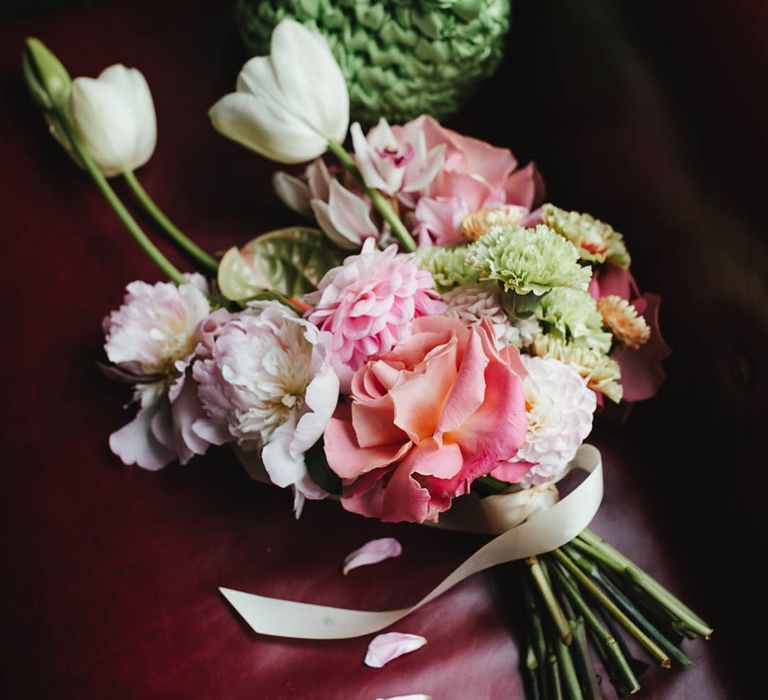 pink, green and white wedding bouquet with tulips, peonies, dahlias and roses 