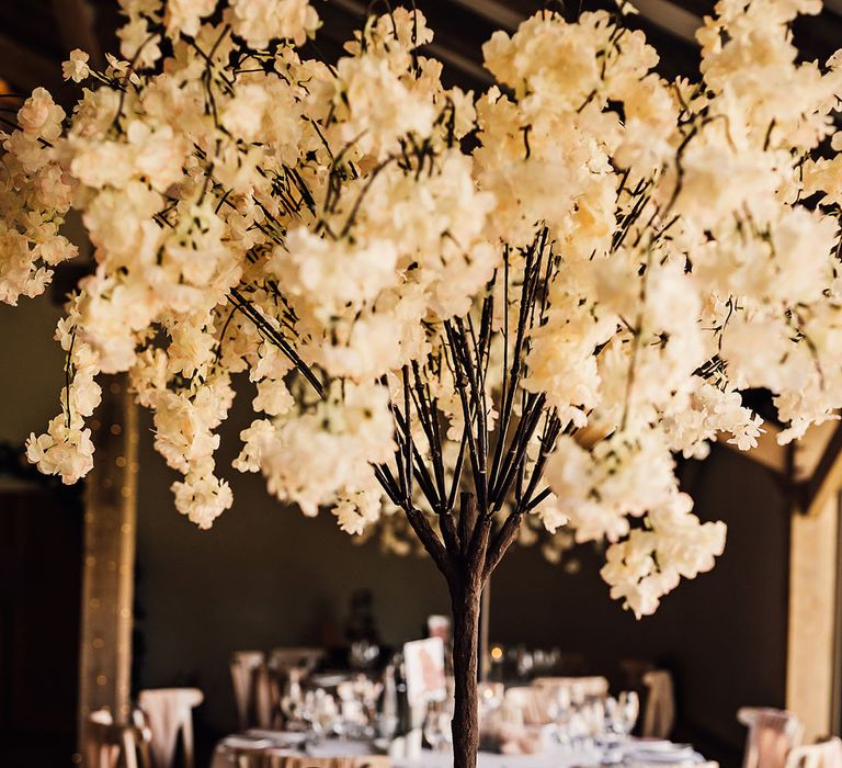 Weeping blossom tree centrepieces for chic and neutral tablescape 