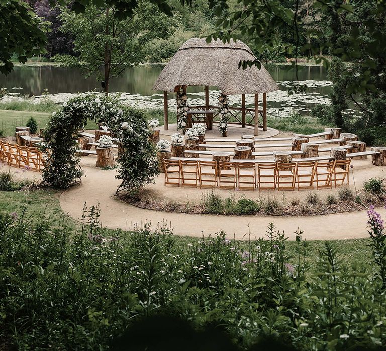 Outdoor woodland wedding ceremony area at The Orangery in Kent 