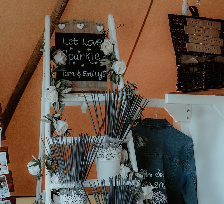 Decorative step ladder complete with chalkboard signage and sparklers 