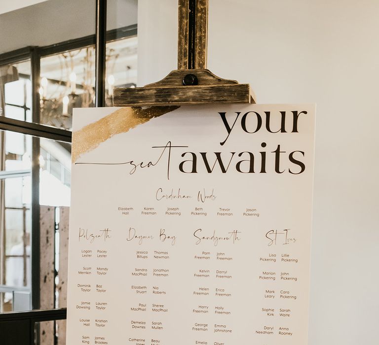 Black and white minimalist wedding table plan signage 