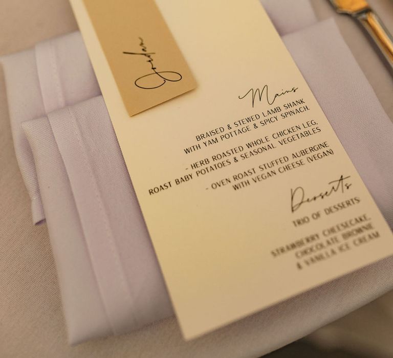 Yellow wedding menu and place name on the day stationery with delicious wedding breakfast 