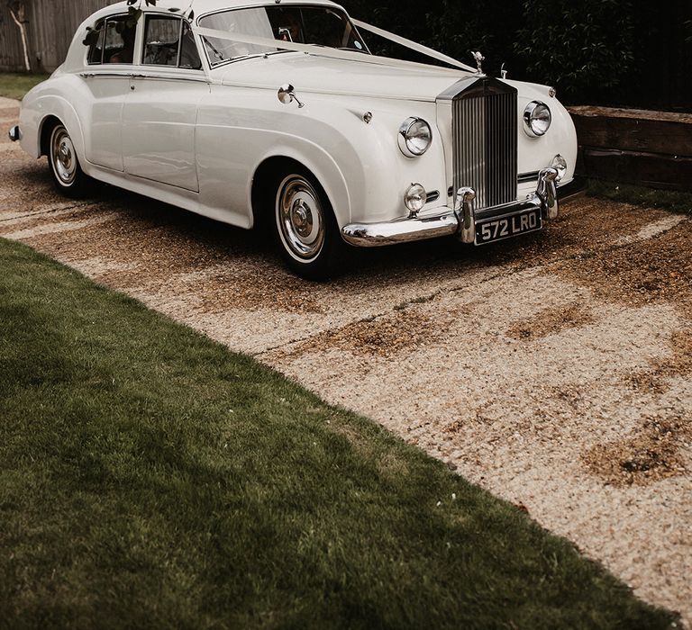 Luxury white vintage wedding car for Surrey wedding 