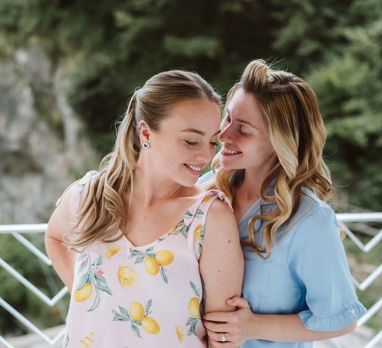 Brides in colourful pyjamas getting ready together for their wedding day 