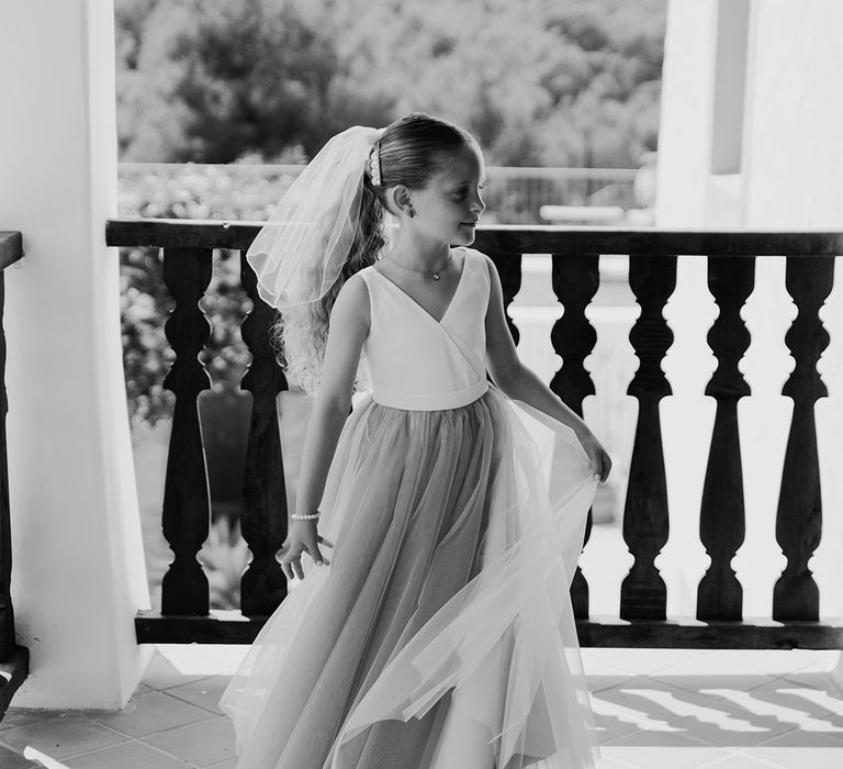 Flower girl wearing tulle dress for destination wedding 