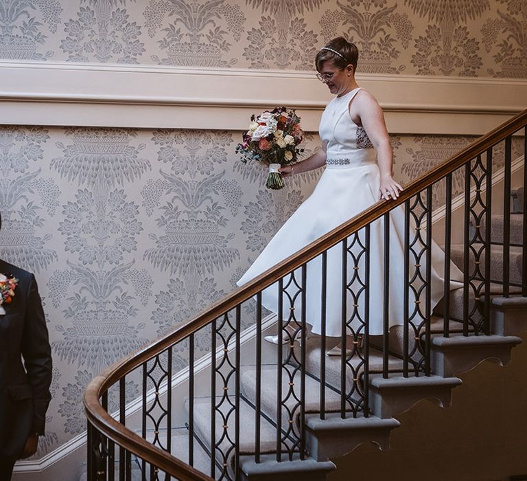 The two brides prepare to se each other for their first look moment 