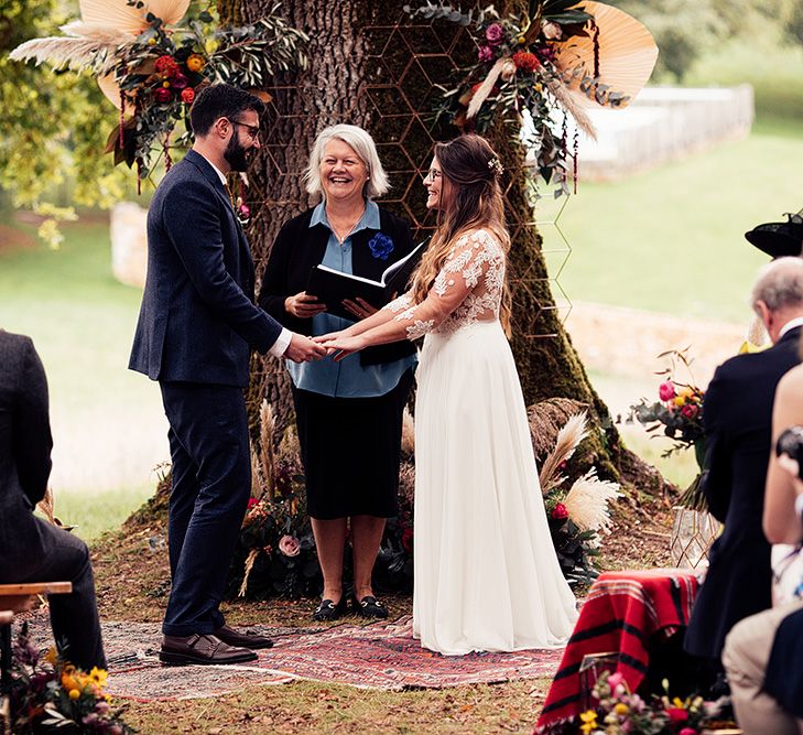 Bride and groom at outdoor wedding ceremony