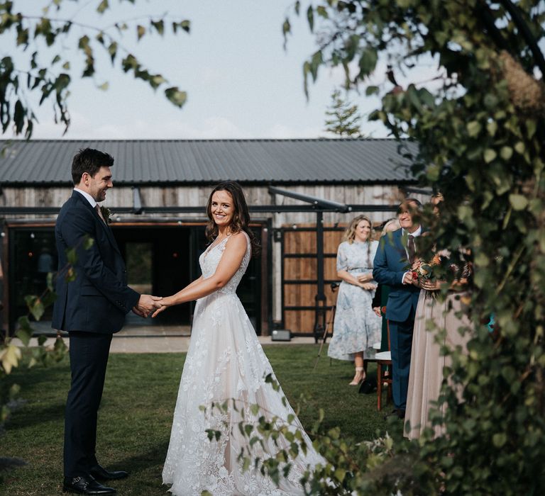 Outdoor wedding ceremony at Willow Marsh Farm