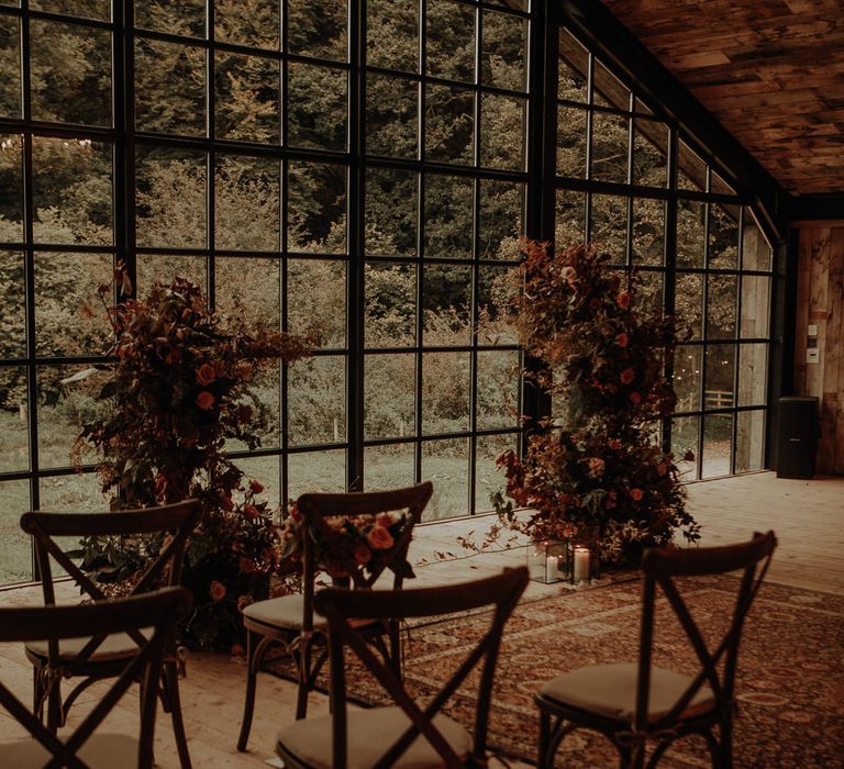 Wooden aisle chairs for socially distanced wedding ceremony 