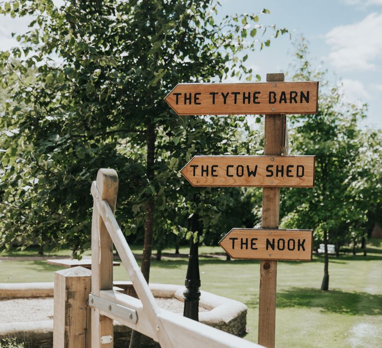 Signage at The Tythe Barn reads 'The Tythe Barn', 'The Cow Shed' and 'The Nook'