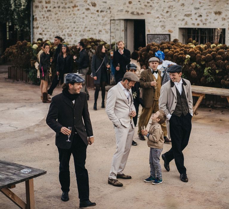 Groom and groomsmen in Peaky Blinder wedding suits 