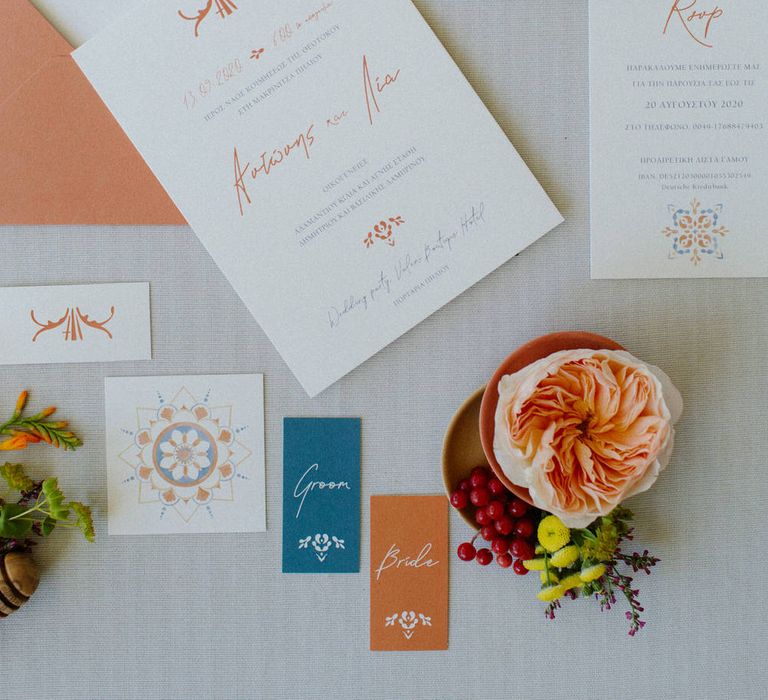 Minimal and traditional Greek wedding stationery with tile detailing