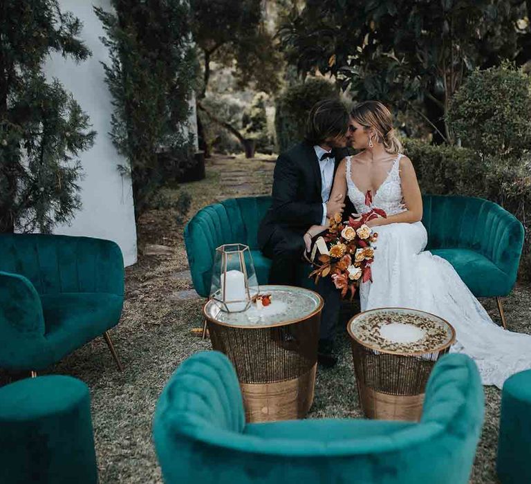 Bride and groom kiss at intimate elopement