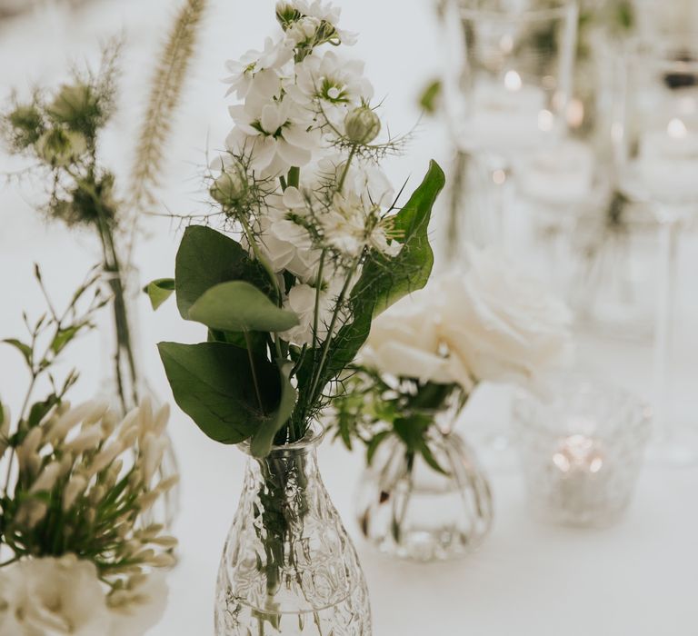 White floral arrangements for The Landmark London wedding reception dinner