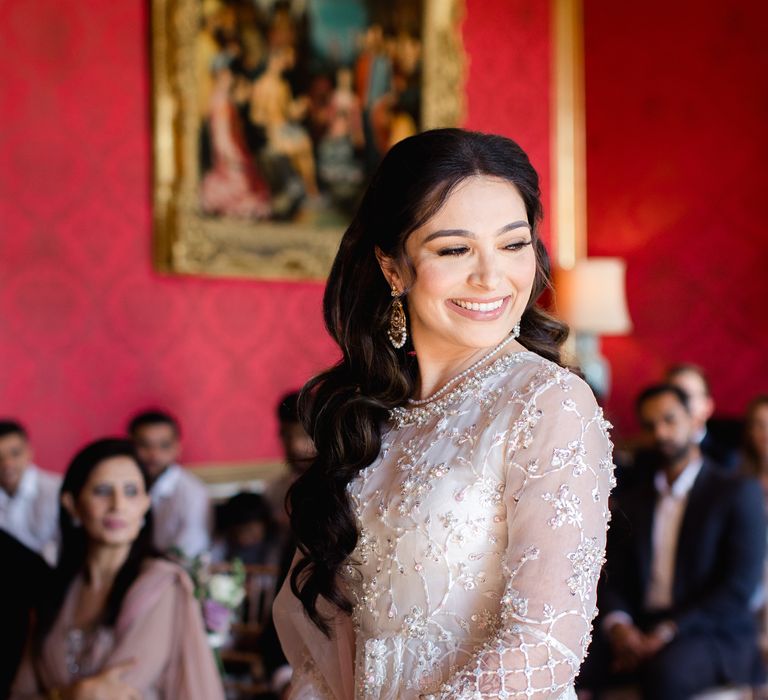 Bride smiles brightly on her wedding day