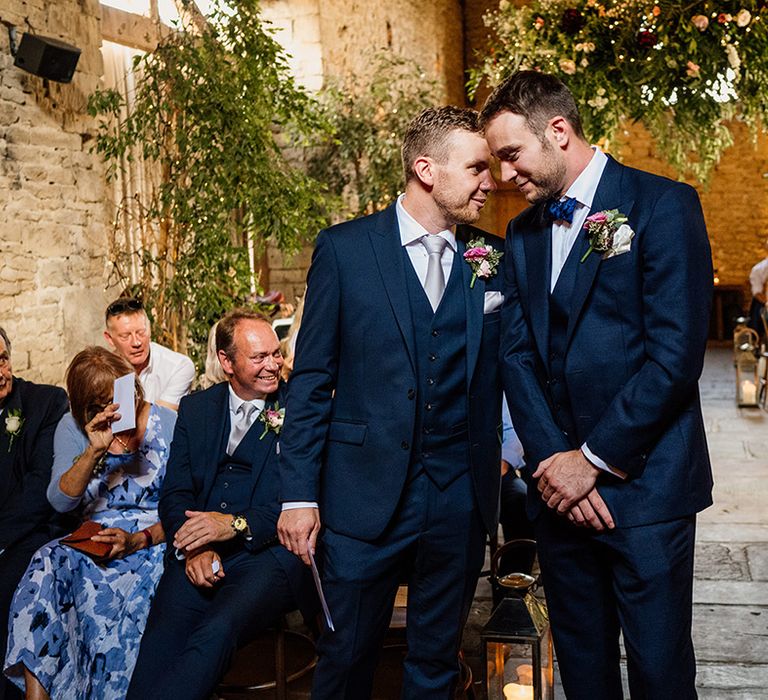 Groom shares a special moment with the best man before the wedding ceremony begins 