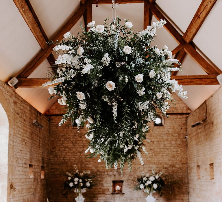 Lapstone Barn wedding venue from the Cotswolds with white wedding flowers 